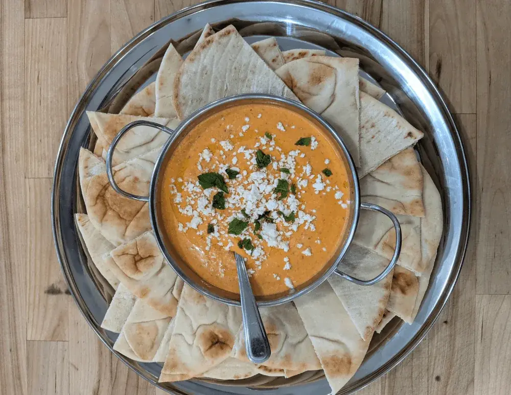Red pepper dip with fresh vegetables for Halifax dinner party